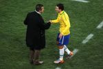 Elano of Brazil is congratulated by Carlos Dunga head coach of Brazil as he is substituted during the 2010 FIFA World Cup South Africa