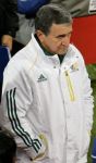South Africa head coach Carlos Alberto Parreira leaves the pitch after the World Cup group A soccer match between South Africa and Uruguay